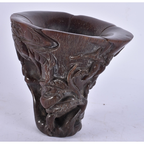 2674 - A CHINESE HORN TYPE LIBATION CUP. 14 cm x 12 cm.