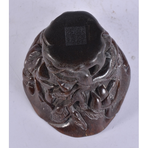 2674 - A CHINESE HORN TYPE LIBATION CUP. 14 cm x 12 cm.