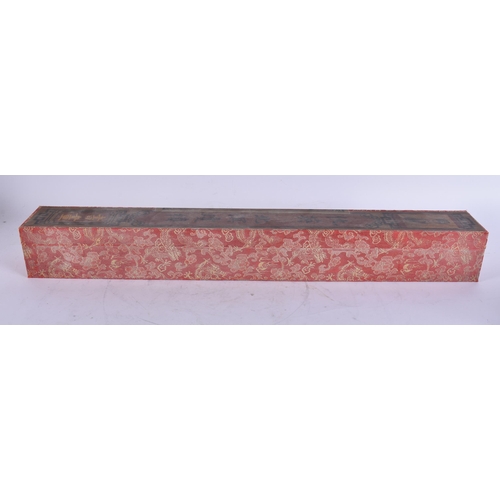 2701 - A SEALED CHINESE SCROLL. Box 62 cm long.