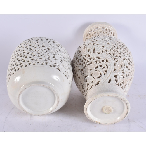 2710 - TWO EARLY 20TH CENTURY CHINEE RETICULATED BLANC DE CHINE VASES Late Qing/Republic. Largest 30 cm hig... 