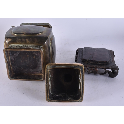 2712 - A CHINESE QING DYNASTY BRONZE CENSER AND COVER bearing inscription to base. 36 cm high.