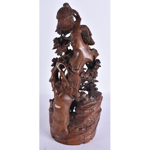 2723 - A LARGE 17TH CENTURY CHINESE CARVED BAMBOO MOUNTAIN GROUP Kangxi, modelled as deer below flowering v... 