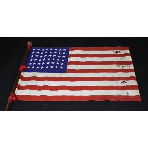 3013 - A vintage American flag with wooden pole possibly for maritime use 104cm