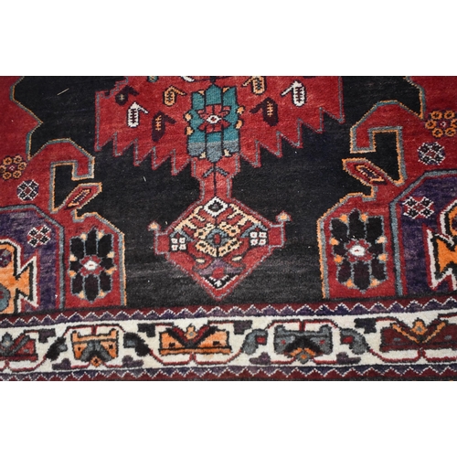 3024 - A hand made Iranian Heriz wool rug 208 x 131 cm