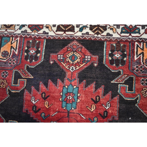 3024 - A hand made Iranian Heriz wool rug 208 x 131 cm