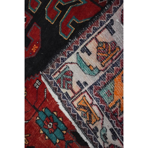3024 - A hand made Iranian Heriz wool rug 208 x 131 cm