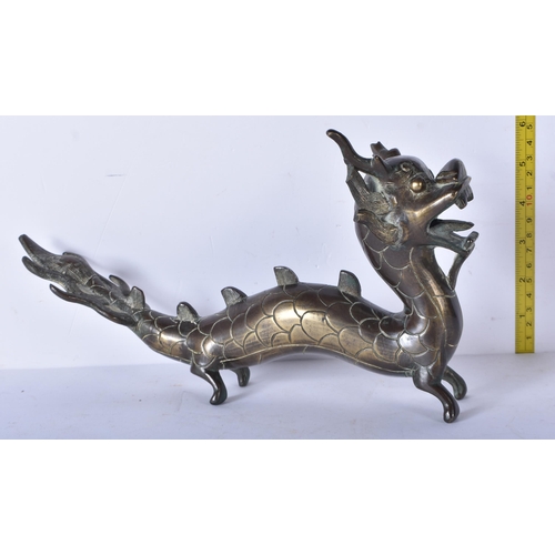 3038 - A Chinese bronze dragon 16 x 31cm