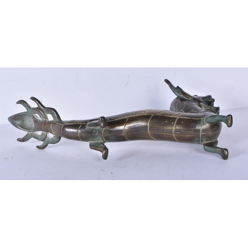 3038 - A Chinese bronze dragon 16 x 31cm