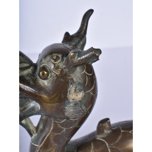 3038 - A Chinese bronze dragon 16 x 31cm