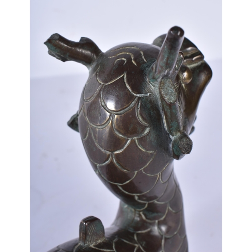3038 - A Chinese bronze dragon 16 x 31cm