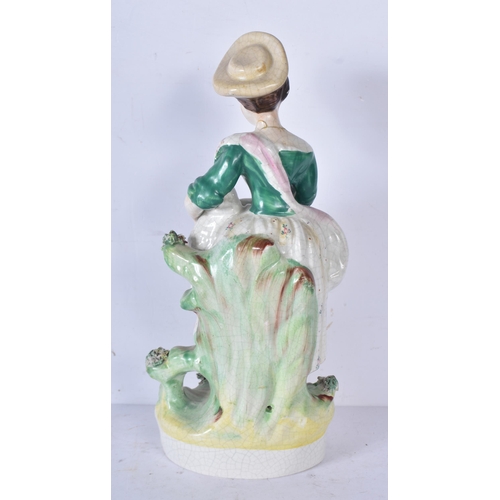 3056 - A large 19th Century Staffordshire  porcelain Dog together with another dog and a shepherdess 35cm ,