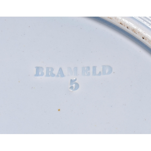 3060 - A 19th Century Rockingham pearlware octagonal plate decorated with a oriental pattern and impresses ... 