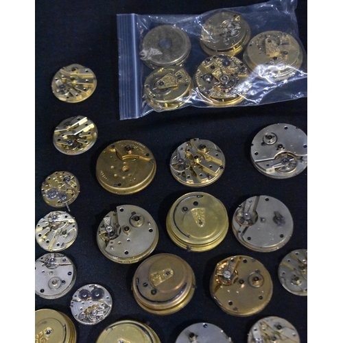 3078 - A collection of pocket watch faces and workings (Qty)