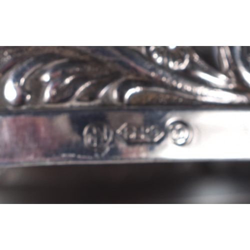 3084 - A pair of Dutch Silver plate bottle holders marked Gero 90 marks 5 x 7.8cm (2)