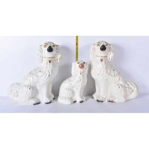 3100 - Three antique Staffordshire porcelain dogs 33cm (3)