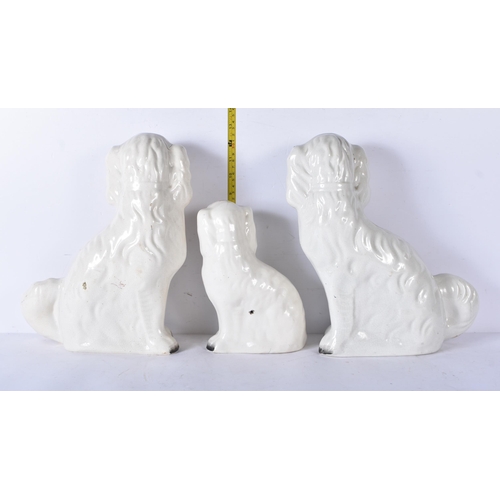 3100 - Three antique Staffordshire porcelain dogs 33cm (3)