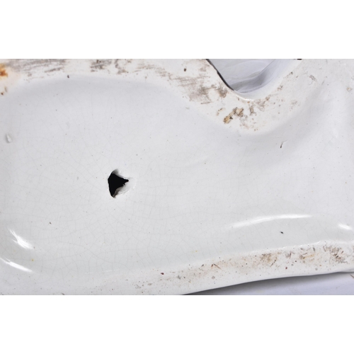 3100 - Three antique Staffordshire porcelain dogs 33cm (3)