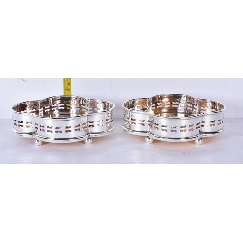 3115 - A pair of silver plated and faux tortoiseshell drinks coasters 5 x 15 x 12cm (2)