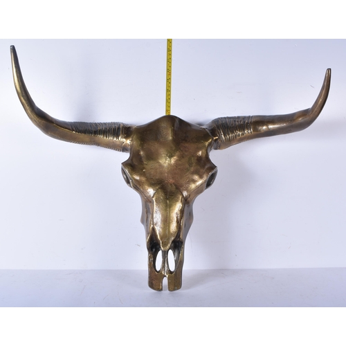 3123 - A large metal bulls skull 68 x 49 cm