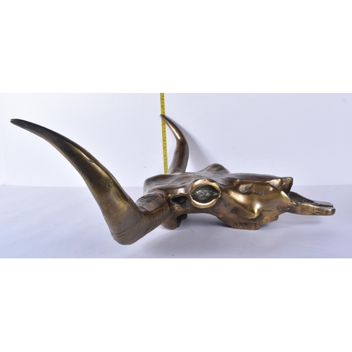 3123 - A large metal bulls skull 68 x 49 cm