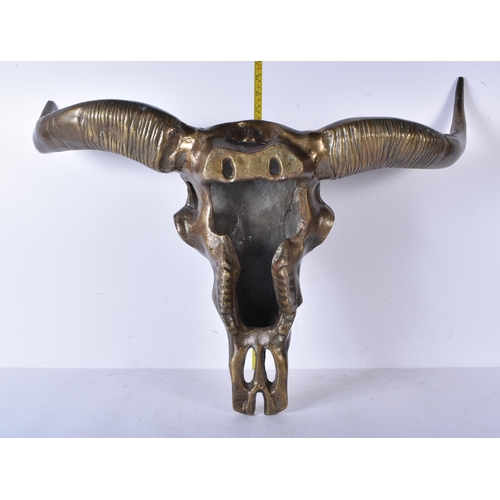 3123 - A large metal bulls skull 68 x 49 cm