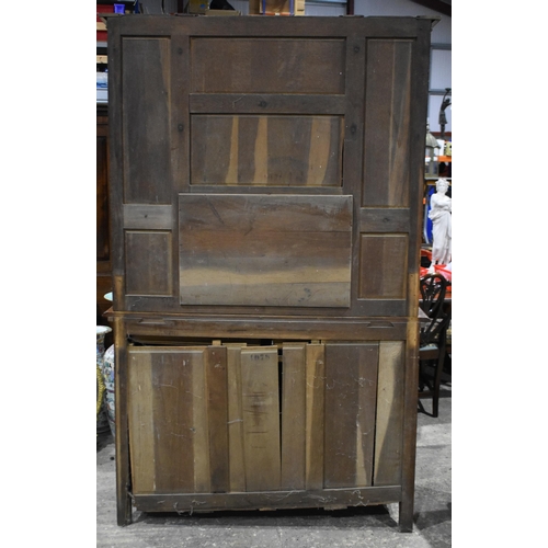 3142 - An Arts and Craft oak Dresser. 200cm x 140cm x 55cm
