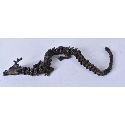 3164 - A Japanese bronze articulated dragon 32cm