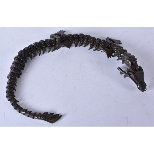 3164 - A Japanese bronze articulated dragon 32cm