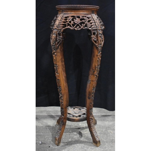 3180 - A Chinese carved hardwood stand with a marble insert 95 x 40cm