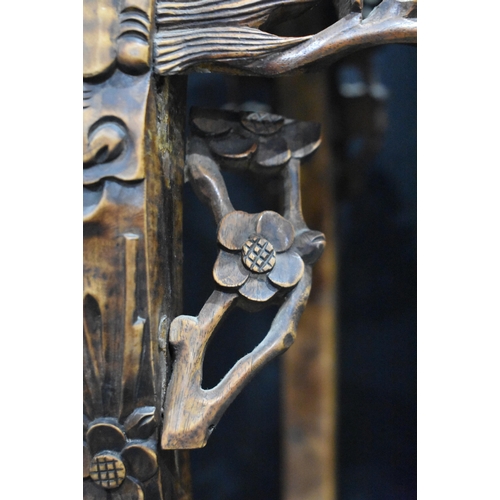 3180 - A Chinese carved hardwood stand with a marble insert 95 x 40cm