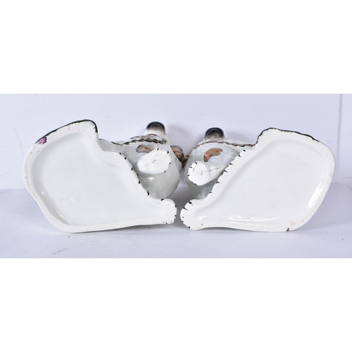 3201 - A pair of antique Staffordshire cats together with two dogs 24cm (4)