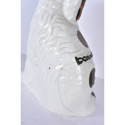 3201 - A pair of antique Staffordshire cats together with two dogs 24cm (4)