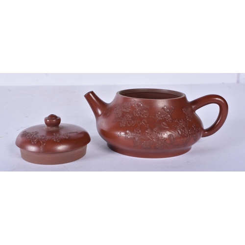 3229 - A Chinese Yixing teapot with a fitted Hardwood stand 9 x 14cm (2)