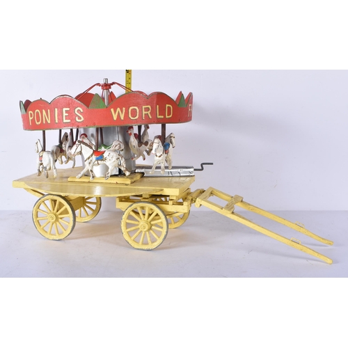3261 - An early 20th Century folk art scratch built wooden and metal model carousel with painted lead and m... 