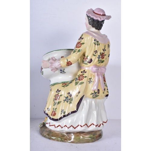 3262 - A pair of porcelain figural bonbon dishes 29cm (2)