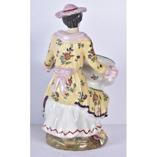 3262 - A pair of porcelain figural bonbon dishes 29cm (2)