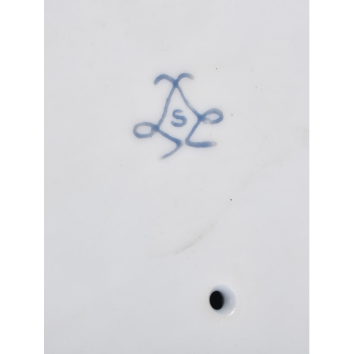 3262 - A pair of porcelain figural bonbon dishes 29cm (2)