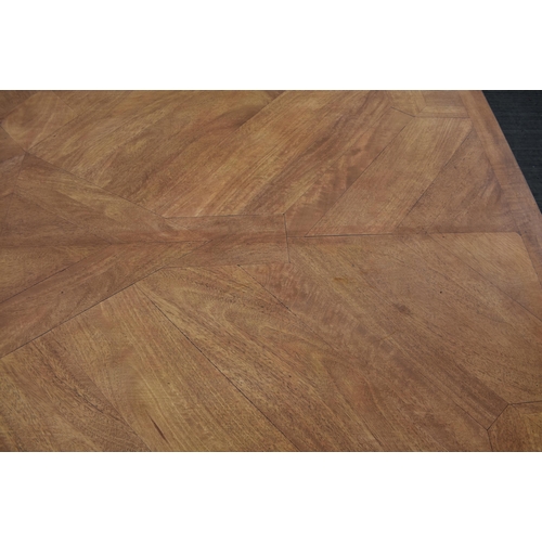 3301 - A large parquetry top dining table with cross member scrolling legs 76 x 90 x 180cm