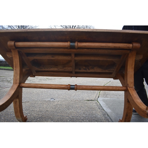 3301 - A large parquetry top dining table with cross member scrolling legs 76 x 90 x 180cm