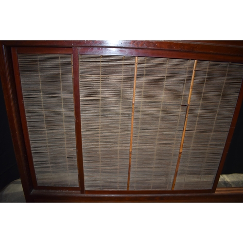 3302 - A Japanese wooden sliding screen with a carved wood fretwork frieze 110 x 133 cm