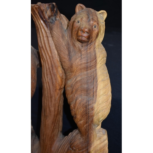 3303 - A large carved wood bear group 102cm