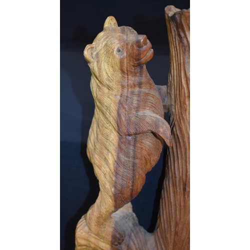 3303 - A large carved wood bear group 102cm
