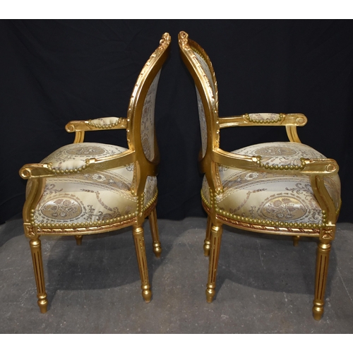 3313 - A pair of gilt wood and upholstered Louis XVI style chairs 104 x 58 x 52cm (2)