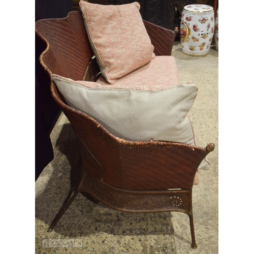 3323 - A metal framed and Rattan Sofa with upholstered seat attributed to Maitland Smith 84 x 157cm