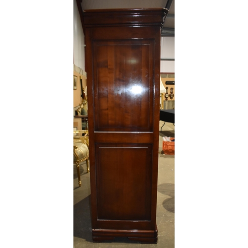 3343 - A large Satinwood Wardrobe with interior shelves, one hanging rail and one drawer 205 x 129 x 60cm