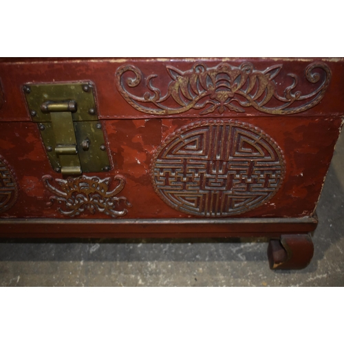 3345 - A pair of early 20th Century Chinese lacquered wood and leather chests 46 x 74 x 47cm (2)
