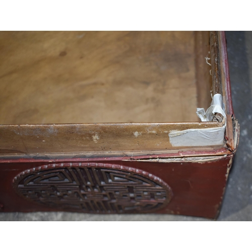 3345 - A pair of early 20th Century Chinese lacquered wood and leather chests 46 x 74 x 47cm (2)