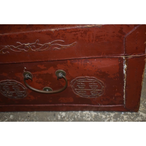 3345 - A pair of early 20th Century Chinese lacquered wood and leather chests 46 x 74 x 47cm (2)