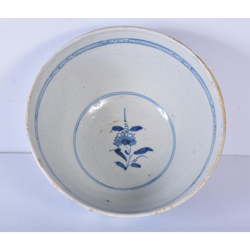 3351 - A 19th Century  Dutch Delft bowl together with a small English blue and white bowl 12 x 21cm (2)