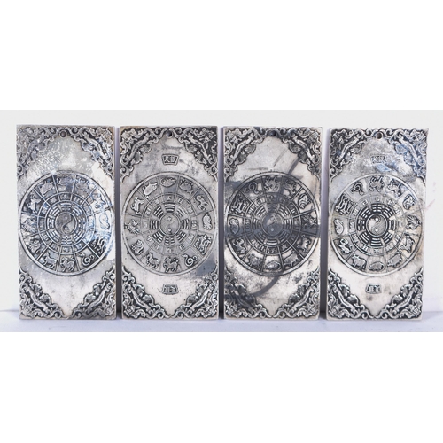 3391 - A collection of Chinese white metal embossed Plaques 10 x 5cm (4)